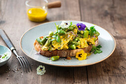 Asparagus and herb scrambled eggs on bread
