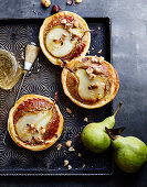 Pear and hazelnut frangipane pies