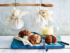 Gluten-free individual boiled pudding with orange custard