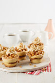 Apple tartlets with whipped cream