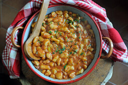 Pisarei- homemade gnocchi in red sauce with beans
