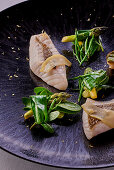 Confit St Peter's fish with seaweed and asparagus vegetables