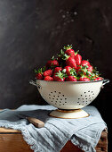 Fresh strawberries in a sieve