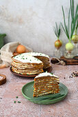 Liver crêpe cake with onions, carrots, and mayonnaise cream