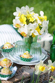 Muffins with pistachios and edible flowers (primroses and daisies)