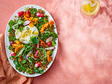 Radish and nasturtium salad with crispy quinoa and burrata