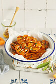 Roasted apricots with pine nuts, honey, and sage