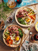 Bibimbap - Korean rice dish with beef, vegetables and fried egg