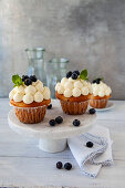 Cupcakes with lemon topping and blueberries