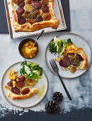 Onion tart with persimmon compote and winter greens
