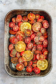 Tomatoes for slow roasting with dried oregano