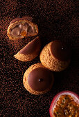 Choux pastry with chocolate cream and passion fruit