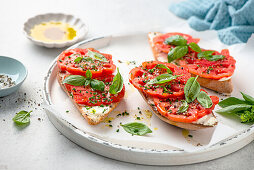 Bruschetta with tomatoes and cream cheese