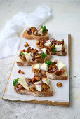 Sandwiches with chanterelles, camembert, and onion confit