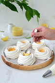 Mini Pavlovas with lemon curd and mascarpone cream