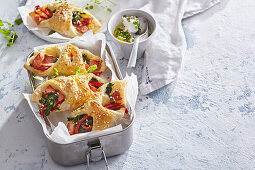 Puff pastry parcels with ham and cheese