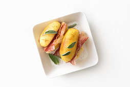 Potato sandwiches with bacon and sage