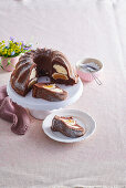 Cocoa bundt cake with curd cheese and peaches