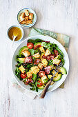 Salad bowl with crispy bacon and blue cheese