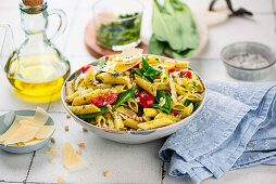 Penne with wild garlic pesto and cherry tomatoes