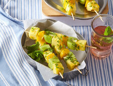 Fruit skewers with kiwi, mango and pineapple