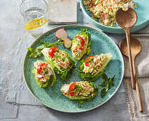Couscous and radish salad in lettuce cups
