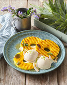Grilled pineapple with coconut ice cream