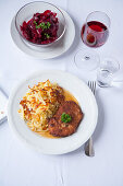 Veal escalope with hash browns and beetroot salsa