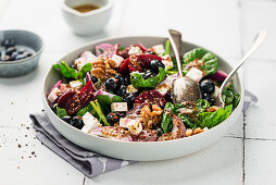 Roasted beetroot and blueberry salad with feta cheese and walnuts