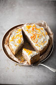 Parsnip and nut cake with orange cream cheese topping