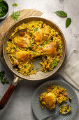 Turmeric rice with raisins and chicken thighs