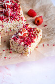 Rice krispie treat with white chocolate and raspberries