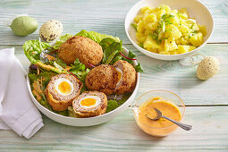 Scotch eggs with potato salad