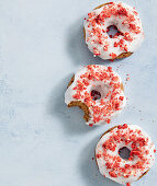Vegan gingerbread doughnuts with freeze-dried strawberries