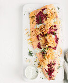 Baked beetroot salmon with crispy filo topping