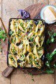 Stuffed shell pasta with broccoli and green peas