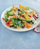 Chopped Mexican taco salad with sweetcorn and avocado