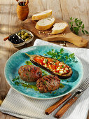 Grilled mince rolls with stuffed aubergines