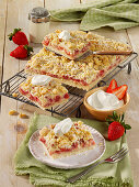 Strawberry and rhubarb pudding cake with crumble topping
