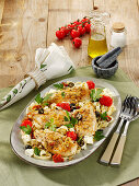 Marinated chicken with tomatoes, olives and feta cheese