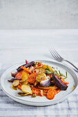 Colourful antipasti with walnuts from the tray