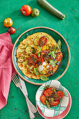 Spicy zucchini omelet with roasted tomatoes
