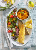Baked trout with sweet potato puree and salad