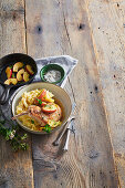 Pork chops with baked apples and parsnip mashed potatoes