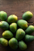 Mangoes on a wooden table
