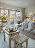 Bright living room in shabby chic style with Christmas decorations