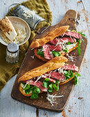 Choux pastry sandwiches with beef and horseradish