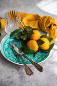 Place setting with tangerines