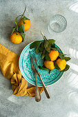Place setting with tangerines