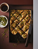 Chocolate and pistachio baklava with Greek coffee and honey syrup